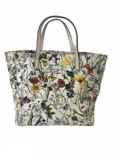 FJ1000741 EEX                               FANCY JEWELRY & LOAN                   GUCCI 282439                                                                                         Description:         For sale we have this amazing multicolor flower themed Gucci shoulder bag model 282439 with dimensions approximately 11"x10"x9". This purse shows minor stains inside bottom of bag, nothing major or extreme. This bag does not come with other accessories such as dust bag or box. This sale is for Luxury Floral Print Top Handle Bag, Elegant Floral Print Shopping Bag, Gucci Multicolor Shoulder Bag, Luxury White Bags With Floral Print, Designer Multicolor Floral Print Bags, Green Gucci Shoulder Bag For Daily Use, Gucci Green Shoulder Bag For Daily Use, Multicolor Floral Print Bags With Double Handle, Multicolor Floral Print Bag With Double Handle