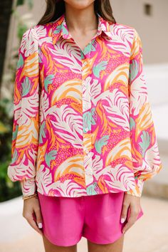 Trust me, you are going to want this button down blouse at your finger tips this spring and summer! That print and those hues are wonderfully bold and bright! You are going to love that this blouse can go from the office to the boardwalk too! Collared neckline Button down front closure Long bubble sleeves Colorful abstract print No stretch Sydney is wearing the small. Spring Multicolor Print Collared Blouse, Spring Collared Blouse In Multicolor Print, Collared Multicolor Print Blouse For Spring, Chic Patterned Shirt For Spring, Chic Pink Floral Print Shirt, Trendy Multicolor Print Button-up Blouse, Spring Multicolor Print Button-up Shirt, Vibrant Long Sleeve Vacation Blouse, Vibrant Long Sleeve Blouse For Vacation