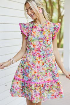 Say hello to this colorful floral babydoll dress with its charming rickrack detailing! Bursting with stunning colors, this dress is sure to brighten your day. The ruffled cap sleeves add a touch of femininity, making it perfect for any occasion. Pair it with sneakers for a fun day out or dress it up with heels for a chic, sophisticated look! Round neckline Button keyhole back Ruffled cap sleeves Colorful floral print Rickrack detailing Babydoll cut No stretch Baileigh is wearing the small. Floral Babydoll Dress, Open Your Heart, Mint Julep Boutique, Pink Floral Dress, Fun Day, Model Fits, Babydoll Dress, Clothes And Shoes, Sophisticated Look