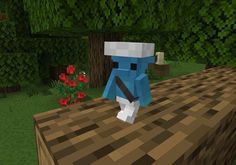 a blue dog standing on top of a wooden table in a minecraft forest area