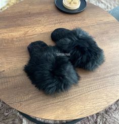 Alpaca fur slippers - alpaca slippers from Peru - unisex slippers - fur slippers - winter slippers - Gift for any occasion - fluffy fur slippers Luxurious Black Alpaca fur slippers The unisex Luxurious Alpaca fur slippers keep your feet nice and cozy even on the most blustery winter's eve. These fur slippers are very well made, ensuring they will last for years. The best part is that these slippers are made from ethically-sourced alpaca fur, ensuring the highest quality and guilt-free comfort. W Cozy Faux Fur Slippers With Round Toe, Fluffy Slip-on Cozy Slippers, Cozy Fluffy Slip-on Slippers, Comfortable Fluffy Sheepskin Slippers, Fluffy Comfortable Sheepskin Slippers, Fluffy Slip-on Slippers For Indoor Use, Fluffy Sheepskin Comfortable Slippers, Fluffy Slip-on Indoor Slippers, Soft Faux Fur Slippers With Round Toe