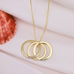 "Custom Ring Necklace And Gold Circle Necklace Which We Offer As 925 Sterling Silver Or 14K Solid Gold İs The Perfect Gift For Mom. The Dainty Name Necklace For Mom 14K Solid Version Also Comes With A 14K Solid Gold Chain. This Handmade Custom Silver Ring Necklace Silver Or Gold Has The Perfect Quality.  Product Hıghlıghts  Personalised Necklace Crafted From High Quality 925 Sterling Silver Or 14K Solid Gold. This Silver Nameplate Necklace Can Be Personalized With Your Or Your Loved Ones Names. White Gold Tarnish-resistant Jewelry For Mother's Day, Fine Jewelry Sterling Silver Infinity Jewelry, Fine Jewelry Sterling Silver Infinity, Sterling Silver Infinity Fine Jewelry, Tarnish Resistant White Gold Jewelry For Mother's Day, Personalized Ring Jewelry For Mother's Day, Personalized Ring For Mother's Day, Tarnish Resistant Silver Jewelry For Anniversary Gift, Silver Tarnish-resistant Jewelry For Anniversary Gift