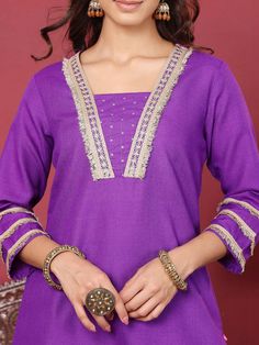 Grab this beautiful 3-piece set. The set comes with ethnic motif printed straight shape kurta has v neck, 3/4th sleeves & calf length teamed with solid trouser pant with side pocket and a dupatta. Color - Lavender Kurta Fabric-Silk Blend Pant Fabric-Silk Blend Dupatta Fabric - Silk Blend Neck-V Neck Sleeves-3/4th Sleeves Work -Ethnic Motif Print Detailing Washing Instructions-Dry Clean DISCLAIMER - The color of the product may be differ due to screen settings of device. A misprint here and a color drop slip there is the beauty of printing which is not treated as a defect. Transitional Anarkali Set With Embroidered Border, Festive Purple V-neck Sets, Festive V-neck Self Design Kurta, Festive Chanderi Kurta With V-neck, Navratri Straight Kurta Palazzo Set With Embroidered Border, Navratri Palazzo Set With Embroidered Border And Straight Kurta, Purple Straight Kurta Sets With Gota Work, Navratri Palazzo Set With Embroidered Border, Purple Gota Work Straight Kurta Sets