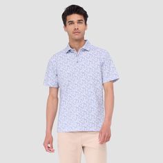 The Victor abstract print OoohCotton short-sleeved polo shirt featuring a three-button placket, mother-of-pearl buttons, and a self-fabric collar is the ideal choice for looking and feeling your best, whether you are enjoying a casual day or performing on the golf course. OoohCotton is a performance, double-mercerized, wrinkle-resistant, breathable, and easy-care cotton blend with 8-way stretch, quick-dry, and thermal comfort properties. Summer Collared Polo Shirt With Button Closure, White Button Closure Polo Shirt For Summer, Short Sleeve Polo Shirt For Summer Golf, Summer Polo Shirt With Short Sleeves, Collared Polo Shirt For Summer, Summer Short Sleeve Polo Shirt For Golf, Collared Polo Shirt With Placket For Summer, Summer Short Sleeve Polo Shirt With Placket, Summer Short Sleeve Polo Shirt