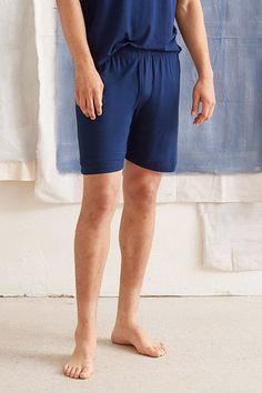 This soft casual short is perfect for lounging around on hot days or keeping cool under the covers. Different from our classic drawstring pants, these shorts have a covered elastic waistband. Made in Canada. 93% Viscose from Bamboo / 7% Spandex. S (28-30), M (32-34), L (36-38), XL (40-42). Machine washable and dryer friendly. Navy Lounge Shorts, Navy Loungewear Shorts With Pockets, Moisture-wicking Cotton Shorts For Loungewear, Shorts Mens Sleep, Blue Short-length Sleepwear With Elastic Waistband, Blue Space, Lounge Shorts, Hot Days, Drawstring Pants