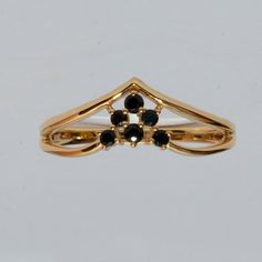 >Metal type:-sterling silver >band colour:-yellow gold plated > Stamp:925 >gemstone:- black Onyx > gem qty-6 pcs 1.8mm  >  CUSTOM  ORDER<   We can create almost any ring , earrings , necklace you desire with high quality and   affordable price. please message us for details. curved wedding bands can be customized for your engagement ring. please order asap and send me  some pictures of your ring.  > ENGRAVING<   I will be happy to add engraving to my jewelry if possible . please message us. > Gold Sapphire Ring With Stone Setting For Formal Occasions, Ring Engraving, Silver Ring Wedding, Birthday Gift Ring, Curved Wedding Band, Ring Wedding Band, Exclusive Jewelry, Wedding Band Ring, Gift Ring