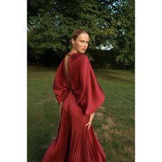 Red (100% high-grade pleated polyester). Gown. Long sleeves. V-neck. Back zipper closure. Imported. Red Formal Dress With Pleated Back, Pleated V-neck Gown For Party, Pleated V-neck Maxi Dress For Gala, Elegant Red Dress With Folds, Pleated V-neck Evening Gown, Pleated V-neck Party Gown, V-neck Pleated Party Gown, Elegant V-neck Gown With Pleated Detail, Party Gown With Draped Sleeves And V-neck