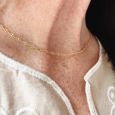 This delicate chain is a reflection of the Phoenicians (ancient Greek ancestors) symbol for life, rebirth and a drive to become godlike. The 19th letter of their alphabet. 18 carat gold over 925 sterling silver. 100% hypoallergenic. 15 inch chain and can extend to 17 inches. Dainty Recycled Gold Chain Necklace Gift, Hypoallergenic 14k Gold Necklace, Dainty Gold Hypoallergenic Chain Necklace, Classic Hypoallergenic Chain Necklace As Gift, Classic 14k Gold Hypoallergenic Necklaces, Classic Hypoallergenic 14k Gold Necklace, Hypoallergenic Link Necklace For Gift, Hypoallergenic Gold-plated Necklace For Anniversary, Hypoallergenic Gold Plated Necklace For Anniversary