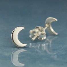 close up of silver crescent moon post earrings Dainty Silver Earrings, Silver Moon Earrings, Mood Stone, Cute Stud Earrings, Moon Studs, Silver Moon, Timeless Jewelry, Moon Earrings, Dark Night