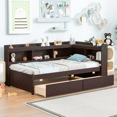 a child's bedroom with a bed, dresser and toy storage unit in it