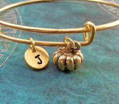 Pumpkin Bangle Bracelet Pumpkin Bracelet Pumpkin Jewelry Halloween Stackable Bangle Pumpkin Charm Br Adjustable Gold Jewelry For Halloween, Handmade Adjustable Jewelry For Fall, Adjustable Handmade Jewelry For Fall, Adjustable Metal Name Bracelet With Charms, Halloween Bracelet Jewelry Gift, Adjustable Gold Bracelets For Halloween, Bangle Pumpkin, Adjustable Name Bracelet With Charms, Halloween Charm Bracelet Gift