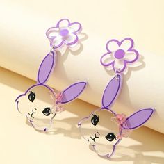 This Unique Pair Is A Wonderful Addition To Your Wardrobe And Your Style; Sure To Get Lots Of Compliments! Great For Easter Or Anytime! Gsunq550200mb7c Cheap Kawaii Earrings For Women, Purple Flower-shaped Earrings, Spring Flower-shaped Purple Earrings, Shrink Plastic Jewelry, Purple Bunny, Rabbit Earrings, Earrings For Sale, Cat Enamel Pin