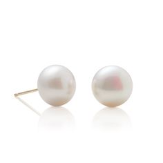 Simple statements of elegance, pearls have been a mainstay in Gump's fine jewelry assortment for decades. Revered for their alluring luster and classic beauty, they are widely recognized as symbols of purity, integrity and wisdom gained through experience. To create these earrings, each pearl is carefully selected for quality, color and shape. Freshwater cultured button pearls, 10mm. 14-karat yellow gold. Pierced only. Button Pearl Earrings, Signature Jewelry, Pearl Gemstone, Freshwater Cultured Pearls, Sapphire Earrings, Pearl Stud Earrings, Simple Earrings, Classic Beauty, Pearl Studs