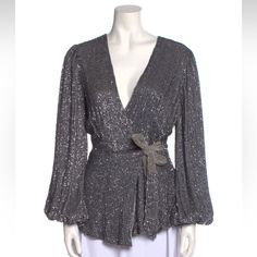 Retrofte Blouse Silver Sequin Embellishments Long Sleeve With V-Neck Sash-Tie Closure At Front Waist: 28.75" Length: 24.5" Bust: 33.75" Color: Silver Fabric: 100% Viscose; Combo 100% Viscose Clothing Size: M Glamorous V-neck Party Blouse, Festive V-neck Evening Blouse, Elegant V-neck Holiday Tops, Glamorous V-neck Blouse For Party Season, Glamorous Formal V-neck Blouse, Glamorous V-neck Cocktail Tops, Elegant V-neck Tops For Festive Occasions, Glamorous V-neck Blouse, Elegant V-neck Blouse For Party Season