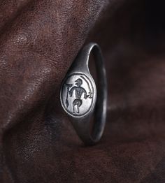 a ring with an image of a man on it