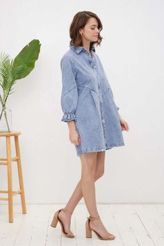 The Washed Denim Mini Dress is a classic and effortlessly stylish piece that belongs in every fashion-savvy closet. Its timeless denim fabric and casual yet elegant design make it a go-to choice for various occasions, from a relaxed day out to a casual evening gathering. This dress offers a comfortable and chic option for those seeking a blend of comfort and fashion in one piece. Style: Casual Fit: Loose Embellishment: Puff Sleeve Neckline: Collar Sleeve: Long Sleeve Length: Short Closure: Butto Chic Washed Long Sleeve Denim Dress, Chic Light Wash Mini Denim Dress, Chic Washed Blue Denim Dress With Pockets, Light Wash Denim Dress For Fall Day Out, Fall Light Wash Denim Dress For Day Out, Light Wash Long Sleeve Denim Dress For Work, Light Wash Long Sleeve Denim Work Dress, Chic Denim Button-up Mini Dress, Fall Denim Dress For Workwear In Light Wash