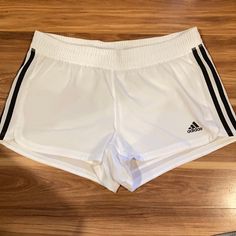 Nwot White Adidas Climalite Shorts. Size Medium. Please Note The Material Is See Through Due To Being Super Lightweight. White Activewear With Three Stripes For Sports, White Three Stripes Activewear For Sports, White Activewear With Three Stripes For Training, White Three Stripes Activewear For Sports Season, White Stretch Athletic Shorts For Jogging, White Athleisure Activewear With Three Stripes, White Bottoms With Three Stripes For Gym, White Adidas Bottoms For Gym, Adidas Stretch Athletic Shorts For Running