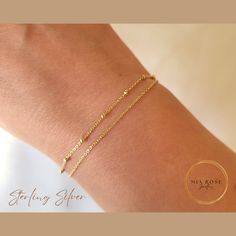 DAINTY CHAIN BRACELET | STERLING SILVER JEWELLERY Gracie is our gold double layered bracelet, featuring a satellite and a plain chain. Perfect for everyday wear or for dressing up on those special occasions WARRANTY This bracelet is covered by our 6 month warranty SIZES S/M is 16cm plus 3cm extension chain M/L is 18cm plus 3cm extension chain DETAILS Made from 925 sterling silver with 18K light gold plating Balls measure approx 2mm PACKAGING Your new jewellery will arrive in a free pouch SHIPPING £1.99 UK shipping via Evri £6.99 International via Evri We aim to ship within 2 days of ordering. If you need it faster, please send us a message and we will see what we can do GIFTING If your order is a gift and being posted directly to the recipient, mark it as a gift and feel free to leave a me Adjustable Delicate Sterling Silver Bracelet As A Gift, 14k Gold Filled Satellite Chain Bracelet As Gift, Dainty Rose Gold Bracelets With Satellite Chain, Dainty Rose Gold Bracelet With Satellite Chain, Delicate Silver Tarnish-resistant Bracelets, Adjustable Rose Gold Bracelet With Satellite Chain, Gold Plated Satellite Chain Bracelet Gift, Gold Plated Satellite Chain Bracelet As Gift, Adjustable Silver 14k Gold-filled Chain Bracelet