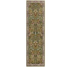 a long rug with an ornate design on the bottom and sides, in various colors