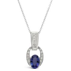 Metal: 14K White Gold Gemstones: 2.30 Cts. Tanzanite 0.45 Cts. Diamond Oval Diamond Gemstones For Formal Occasions, Formal Oval Diamond Gemstones, Luxury Oval Cubic Zirconia Gemstones, White Gold Gemstones With Accents Fine Jewelry, Oval Diamond Gemstones With Accents, Elegant Oval Brilliant Cut Gemstones, Elegant Oval Gemstones With Accents, Formal Tanzanite Jewelry With Diamond Accents, Oval White Gold Gemstones With Brilliant Cut