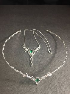 Celtic Knot Bridal Jewelry Set Emerald Trinity Knot Tiara | Etsy Wedding Jewelry With Stone Setting In Sterling Silver, Sterling Silver Gemstone Jewelry For Wedding, Silver Stone Wedding Jewelry, Silver Wedding Jewelry With Stones, Sterling Silver Wedding Jewelry With Stones, Wedding Sterling Silver Jewelry With Stones, Wedding Jewelry In Sterling Silver With Stones, Adjustable Green Jewelry For Wedding, White Gold Birthstone Jewelry For Wedding