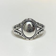 This Vintage Sterling Silver Oval Filigree Ring is a delicate and intricate piece, showcasing timeless craftsmanship. The oval filigree design is elegantly set in sterling silver, marked 925, offering a classic and sophisticated look. With a face measuring 12mm, this ring is the perfect addition to any collection. Details: Metal: Sterling Silver (marked 925) Total Weight: 2.1 grams Face Measurement: 12mm Condition: Very good A charming and versatile piece, ideal for everyday wear or special occa Filigree Design, Filigree Ring, Vintage Sterling Silver, Band Rings, Special Occasion, Everyday Wear, Jewelry Rings, Band, Sterling Silver