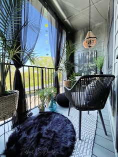 the balcony is decorated with plants and wicker furniture