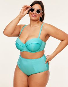 The Rachelle two-piece swimsuit in a medium blue is perfect for a day at the beach or lying poolside. This balconette bikini comes with a supportive underwire, fully adjustable straps, and matching high-waisted bottoms. (Available in plus-sizes 38DD-46DDD.) Underwire Swimwear With Built-in Bra For Pool, Summer Underwire Swimwear With Adjustable Straps, Underwire Swimwear With Padded Cups For Sunbathing, Padded Tankini For Pool Beachwear, Summer Padded Underwire Swimwear, Summer Swimwear With Padded Underwire Cups, Summer Swimwear With Removable Bra Pads And Underwire, Summer Underwire Swimwear With Padded Cups, Padded Blue Swimwear For Pool