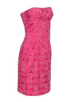 Live out your Barbie dreams in this playful pink brocade strapless corset dress by Nicole Miller. Featuring a flirty tie back and styled to perfection with a strappy heel and jeweled clutch, this mini dress is sure to make a statement wherever you go. Size 6 Made in USA 75% Acetate, 22% Polyester, 3% Lycra Fully lined Invisible side zipper Lave up back detail Strapless Bust 36" Waist 32" Length 30.5" Fitted Knee-length Strapless Dress With Lining, Pink Strapless Cocktail Dress With Ruched Bodice, Fitted Feminine Strapless Dress For Formal Occasions, Summer Formal Strapless Fitted Dress, Feminine Fitted Strapless Dress For Formal Occasions, Feminine Fitted Formal Strapless Dress, Pink Strapless Dress With Ruched Bodice For Formal Events, Pink Strapless Dress With Ruched Bodice For Prom, Pink Strapless Dress With Lined Bodice For Prom