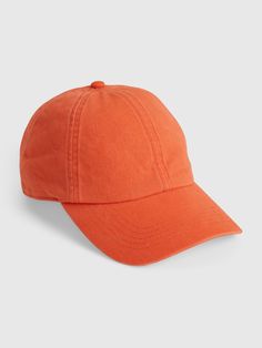 an orange baseball cap on a white background