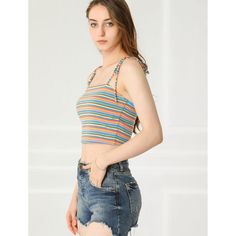 This feminine beach cropped top is styled with charming multicolor stripes and tie shoulder straps. A stretchy slim top that also makes a cute underlayer for streetwear boasts a riveting rainbow of stripes. A chic fashion and now an essential for today, this cami top is made from a soft, stretchy knit jersey with spaghetti straps for a comfortable fit. Casual Summer Tank Top With Straps, Casual Sleeveless Striped Crop Top, Casual Striped Sleeveless Crop Top, Trendy Striped Cotton Tank Top, Striped Summer Tank Top For Beach, Summer Striped Tank Top For Beach, Striped Summer Tank Top For The Beach, Summer Striped Tank Top For The Beach, Trendy Cropped Tank Top With Adjustable Straps