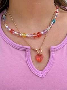 The perfect summer accessory- necklaces with the cutest rainbow beads!! Adds some fun and color to every outfit and is THE necklace of the summer!! Approx. Length 16.5+2" Add another necklace! Fruity Charm Necklace https://www.aspynandivy.com/products/fruit-charm-necklace?_pos=2&_sid=52fe803c9&_ss=r Trendy Beaded Chain Charm Necklaces For Jewelry Making, Trendy Colorful Jewelry With Heart Beads, Rainbow Beaded Chain Necklace Trendy Style, Trendy Rainbow Beaded Chain Necklace, Trendy Colorful Necklace With Tiny Beads, Everyday Trendy Heart Bead Necklaces, Trendy Everyday Heart Beads Necklace, Trendy Necklace With Heart Pendant And Beads, Trendy Everyday Necklaces With Heart Beads