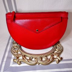 Brand New Retails For $88 2-In-1 Clutch And Wallet Red, Great Accent Piece To Any Outfit Approx: 10” W X 7” L Half Moon Clutch With A Peekaboo Removable Wallet. The Wallet Has 8 Card Slots And 1 Money Slot. Gold Hardware. Chic Red Wallet With Card Slots, Chic Red Clutch With Gold-tone Hardware, Chic Red Crossbody Clutch, Trendy Red Wallet With Cell Phone Pocket, Tan Clutch For Everyday Use, Chic Red Evening Wallet, Red Clutch With Removable Pouch, Red Clutch With Cell Phone Pocket For Gift, Red Clutch With Cell Phone Pocket As Gift