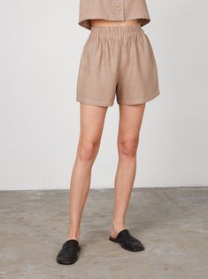 "ISLA is a high waist linen shorts. DETAILS - High waist - Elasticated waist - Side seam pockets - Oeko-Tex certified 100% lightweight linen - Cut and sewn to order just for you in our studio COLOR - Sand Brown, you can also choose other colors above - Fabric samples are available here https://www.etsy.com/listing/586569696/linen-fabric-samples SIZING & FIT - Fits true to size - Model is 5'10\" / 178cm tall and wears size S CARE FOR LINEN - Machine wash up to 30ºC/86ºF gentle cycle - Lay flat to dry or tumble dry low - Warm iron if needed - Do not bleach SIZE GUIDE Size conversion guide Size XS (US 0-2, IT 36-38, UK 4-6, Japan 3-5, France 32-34) Size S (US 4-6, IT 40-42, UK 8-10, Japan 7-9, France 36-38) Size M (US 8-10, IT 44-46, UK 12-14, Japan 11-13, France 40-42) Size L (US 12-14, IT 4 Linen Crop Top, Linen Tank Top, Linen Tank, Bolero Jacket, Linen Shorts, Sleeveless Blouse, Linen Pants, Handmade Clothes, Fabric Samples