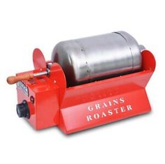 a red machine that is sitting on top of a white surface with the words brans roaster printed on it