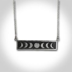 There is something so mystical and magical about the imagery of the phases of the moon. Perhaps it's the fact that the moon has impact on our ocean tides as well as life on this planet. Maybe its because no matter where we are on earth, we are all looking at the same moon. There's something really beautiful and comforting in that idea.OVERVIEW➸Each pendant is cast in solid sterling silver from an original hand fabricated model ➸Moon phase pendant measures approx.  2" x 3/8"➸Each pendant is uniqu Mystical Adjustable Moon Phase Jewelry, Adjustable Mystical Moon Phase Jewelry, Adjustable Engraved Moon-shaped Jewelry, Adjustable Engraved Moon Jewelry, Adjustable Moon Phase Jewelry, Mystical Moon Phase Sterling Silver Necklace, Mystical Moon Phase Sterling Silver Jewelry, Mystical Silver Necklace With Moon Phase, Spiritual Moon Necklace With Oxidized Finish