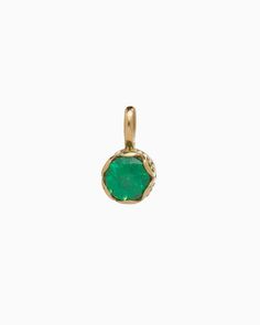 Crafted in 14K solid gold, the Princess Petroglyph Stone Pendant features a faceted green zircon stone encircled by intricate petroglyphs. Its unique design adds a touch of elegance to any outfit, and pairs wonderfully with our Princess Petroglyph Stone Studs. Metal: 14K solid gold Stone: Green zircon Dimensions: 16mm x 8mm Stone Size: 8mm Style #: GP160Gz Green Jewelry With Bezel Setting For May Birthstone, Green Bezel Set Jewelry For May Birthstone, Heirloom Jewelry With Bezel Setting For May Birthstone, May Birthstone Faceted Yellow Gold Jewelry, May Birthstone Yellow Gold Faceted Jewelry, 14k Gold Gemstones For May Birthstone, Faceted Yellow Gold Jewelry For May Birthstone, Yellow Gold Faceted Jewelry For May Birthstone, Green Recycled Gold Jewelry For May Birthstone