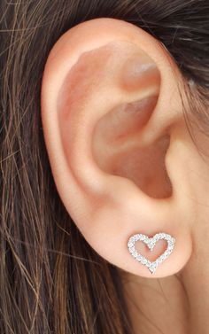 Unlock your heart's desire with our Adore Me Heart Stud Earrings. Made from .925 sterling silver, these earrings are perfect for everyday wear and come with secure earring backs. Add a touch of love and elegance to your outfit with these stunning stud earrings. Heart Earring, Pearl Cuff, Bear Pendant, Ear Cuff Earings, Heart Stud Earrings, Star Earrings Stud, Adore Me, Ear Rings, Star Studs