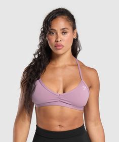 IT’S NOT YOU, IT’S YOUR SPORTS BRA With lightweight, breathable designs, comfortable cups and supportive straps, you can rely on our sports bras to be there for you, and for yours. • Personalise your look by mix and matching the removable bra straps• Lower coverage• Did someone say back day? SIZE & FIT• Low support• Body fit• Model is 5'3" and wears a size S MATERIALS & CARE• 78% Polyester, 22% Elastane SKU: B3A2J-PBZS Gymshark Minimal, Short Bride, Athletic Dresses, Cute One Piece Swimsuits, Gym Jacket, Minimiser Bra, Back Day, Workout Sets, Sport Dress