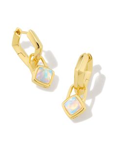 Simple yet chic, these heirloom-quality huggies are ready to refresh your ear stack. The Greer 18k Gold Vermeil Huggie Earrings in White Kyocera Opal feature an angular silhouette mirroring the cushion cut of its opal charms, which you can remove when you’re looking for something more minimal. Metal 18k Yellow Gold Vermeil What is Vermeil? Vermeil (that’s pronounced ver-may) is a gold plating technique that dates back to the 19th century. While other jewelers plate over less durable metals, our Gold Gemstone Huggie Earrings, Gold Huggie Earrings With Gemstone, Plating Techniques, Ear Stack, Demi Fine Jewelry, Huggie Earrings, Huggies Earrings, Cushion Cut, Kendra Scott