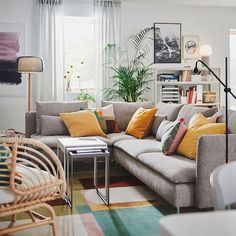 a living room filled with lots of furniture