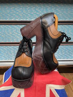 "Absolutely stunning pair of 70s Glam rock platform shoes. Noddy holder from Slade would have been proud of these beauties 👌. Made by a famous name of the time \"Kingsway\" that made many a different styles around this time. Mainly black leather upper with light tan and darker brown platform sole and heel that seems to be formed of one kinda Crepe rubber block with lovely stitching detail on both sides and the rear,these will not wear down and will last many more years,the shoes themselves have not been worn much and are in outstanding condition. Heel measures near 5\" inches high and the sole at widest point is just over 2\" inches. Fits a uk size 8 USA 9 Euro 42. Please check out my other vintage pieces  My Generation vintage on instagram and facebook" 70s Fashion Vintage, 1970s Glam, 70s Glam Rock, Giuseppe Zanotti Boots, Noddy Holder, 70s Glam, Mens Loafers, Vintage Ysl, Beautiful Maxi Dresses