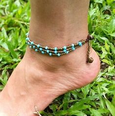 Hand Made Fair Trade Anklet Three Strand Brass Turquoise Adjustable 2 sizes Hand Made Anklets From Thailand Bohemian Turquoise Anklets For Festivals, Bohemian Beaded Anklet Bracelet For Festivals, Adjustable Blue Bohemian Anklets, Bohemian Anklets With Sliding Knot For Festivals, Bohemian Nickel-free Anklets For Festivals, Adjustable Nickel-free Bohemian Anklets, Adjustable Festival Anklets With Tiny Beads, Brass Beaded Bracelets For Festivals, Adjustable Nickel-free Anklets For Festival