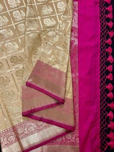 Gorgeous Biscuit Color Silk Saree with Pink Grand Pallu. Floral Buttas designs all over the body of the Saree with Red borders and Hot pink Pallu.  Blouse pieces is Pink matching the Pallu with tassels adding to the beauty of the Saree.  Item : Saree Base Fabric : Banarasi Silk Color : Biscuit Color with Pink  Blouse piece : Comes with un-stitched Blouse piece. Fall & Edging (Yes/No) : Yes Disclaimer -: - Color variation is possible due to various reasons like phone or desktop setting, resolution etc. Please don't hold us responsible. Our aim is to put the exact color of the Saree. - If the Saree is Pure Silk, we will put it very clearly in our listing that it is Pure Silk. If we do not mention its Pure Silk please do not assume it is Pure Silk. When in doubt please feel free to check with Pink Art Silk Saree With Embroidered Border, Pink Banarasi Silk Fabric With Pallu Embroidery, Traditional Pink Saree With Border, Pink Art Silk Pre-draped Saree With Embroidered Border, Pink Saree With Golden Border, Biscuit Color, Men's Ethnic Wear, Bandhani Saree, Kantha Stitch