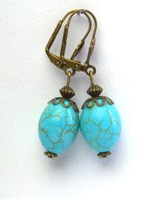 "Vintage turquoise earrings Simple and elegant earrings in two styles: in a bronze frame and in a silver frame. This turquoise dangle earrings is a good accessory for work or everyday use. Dress these up or down; a great basic. These earrings will add a pop of color to your ears. A great addition to your spring and summer wardrobe. My jewelry is unique and custom designed and most of my jewelry can easily be resized at no additional charge. I would love to assist you with your custom order, so p Elegant Turquoise Earrings With Lever Back, Elegant Turquoise Brass Jewelry, Bronze Lever Back Drop Earrings, Elegant Turquoise Metal Jewelry, Turquoise Earrings With Lever Back Ear Wires For Gifts, Turquoise Earrings With Lever Back Ear Wires As Gift, Elegant Handmade Turquoise Earrings, Elegant Hypoallergenic Bronze Earrings, Elegant Bronze Hypoallergenic Jewelry