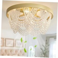 a chandelier hanging from the ceiling in a bedroom