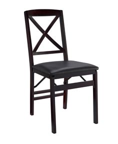 a wooden chair with black leather seat and cross back design on the side, against a white background