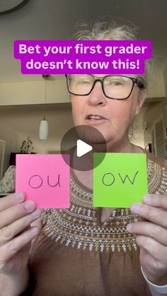 a woman holding up two cards with the words, be your first grader doesn't know this