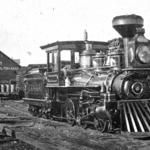 an old black and white photo of a train