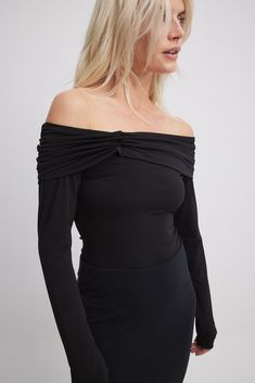 This long sleeve top features a form fit and a slightly sheer stretchy material. It has a folded off shoulder design with a twist detail and a rouched detail at the shoulders. Off Shoulder Design, Shoulder Tops, Off Shoulder Top, Future Fashion, Work Wardrobe, Off Shoulder Tops, Shoulder Design, Top Hat, Shirts & Tops